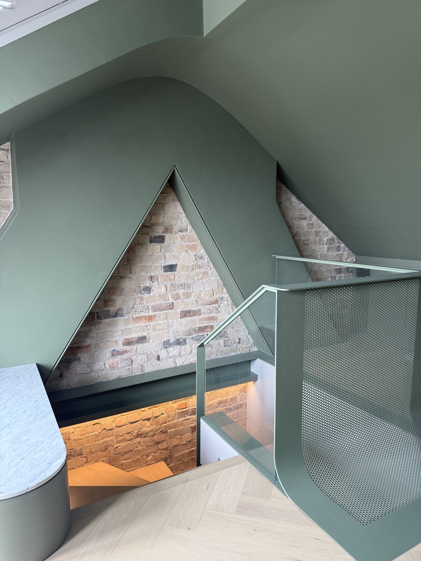 Perforated metal balustrade, attic conversion